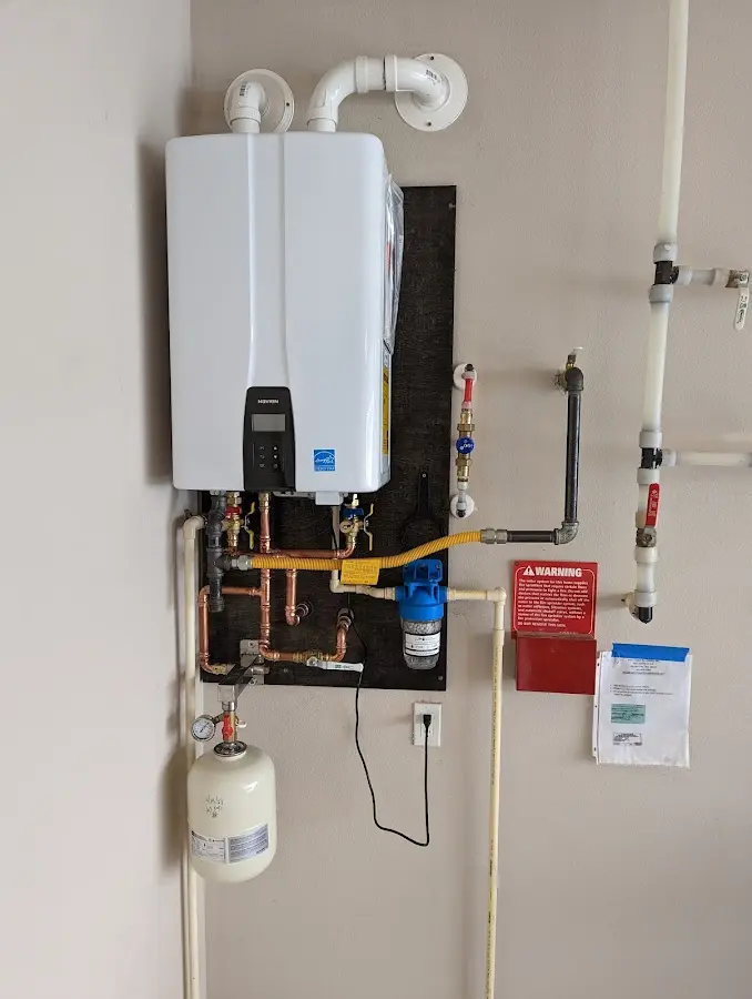 Professional plumber installing copper piping in a Lake Panasoffkee home